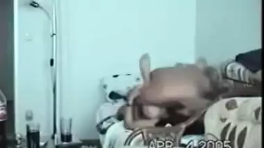 Young indian girl teaching indian how to wear a...