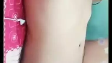 Desi gal grabs camera in time to record how she rubs own XXX pussy