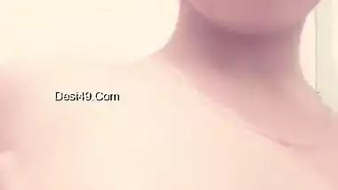 Shower room is a place where the young Desi porn model squeezes tits