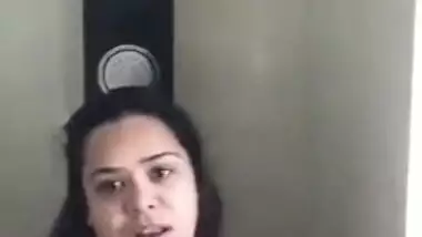 Gorgeous Desi aunty with huge XXX breasts fools around in bathroom