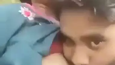 Indian outdoor sex of a guy sucking his GF’s tight boobs