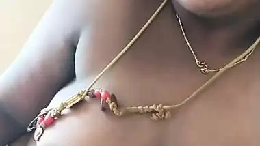 Stepson squeezes his stepmom’s big boob in nude MMS