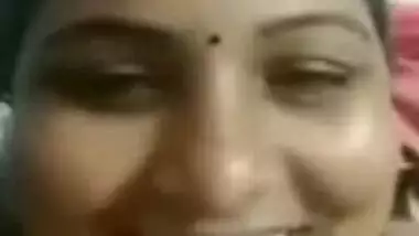 Horny male client jerks off to nude XXX tits of Desi MILF online