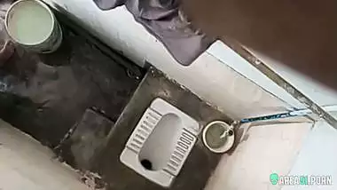 XXX clip of village aunty taking bath in outdoor taken on her son
