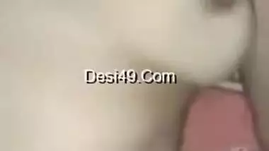 Wife lies on the bed letting the Desi hubby film the porn video