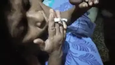 Mature slut smoking cigarette sucking dick at the same time