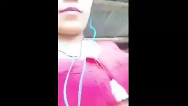Beautiful teen plays with her firm boobs while on a video call with lover