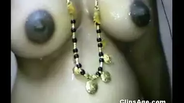 Tamil wife getting water sprayed all over her naked body by husband MMS