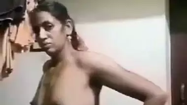 Unsatisfied Tamil village aunty striptease nude MMS