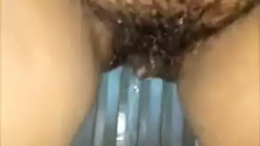 Homemade sex video of Indian woman in hijab playing with long dildo then pees