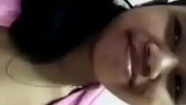 Pretty Desi girl in a pink robe demonstrates XXX slit in MMS video