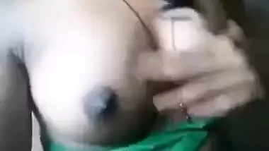 Teen squeezes boobs with small dark nipples for XXX show Desi watchers