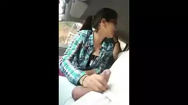 Indian porn mms of a slutty teen giving a blowjob to lover in his car